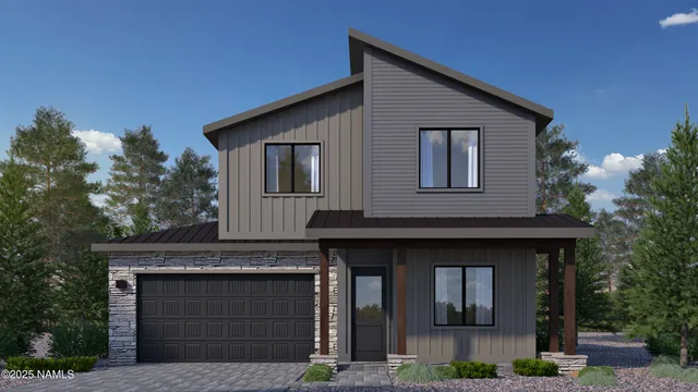 a front view of a house with a garage