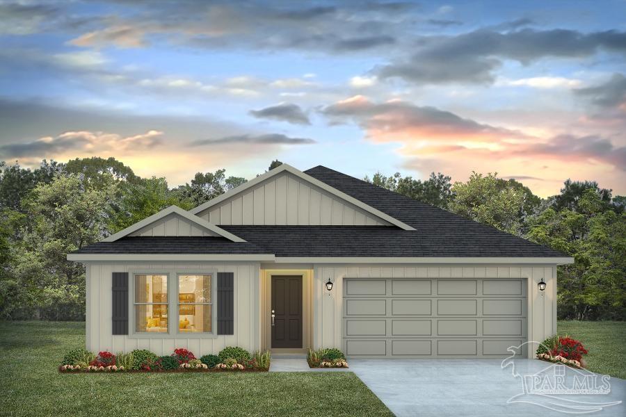 4739 Eider Road Pace, FL 32571 - Photo 1 of 30 a front view of a house with a yard and garage