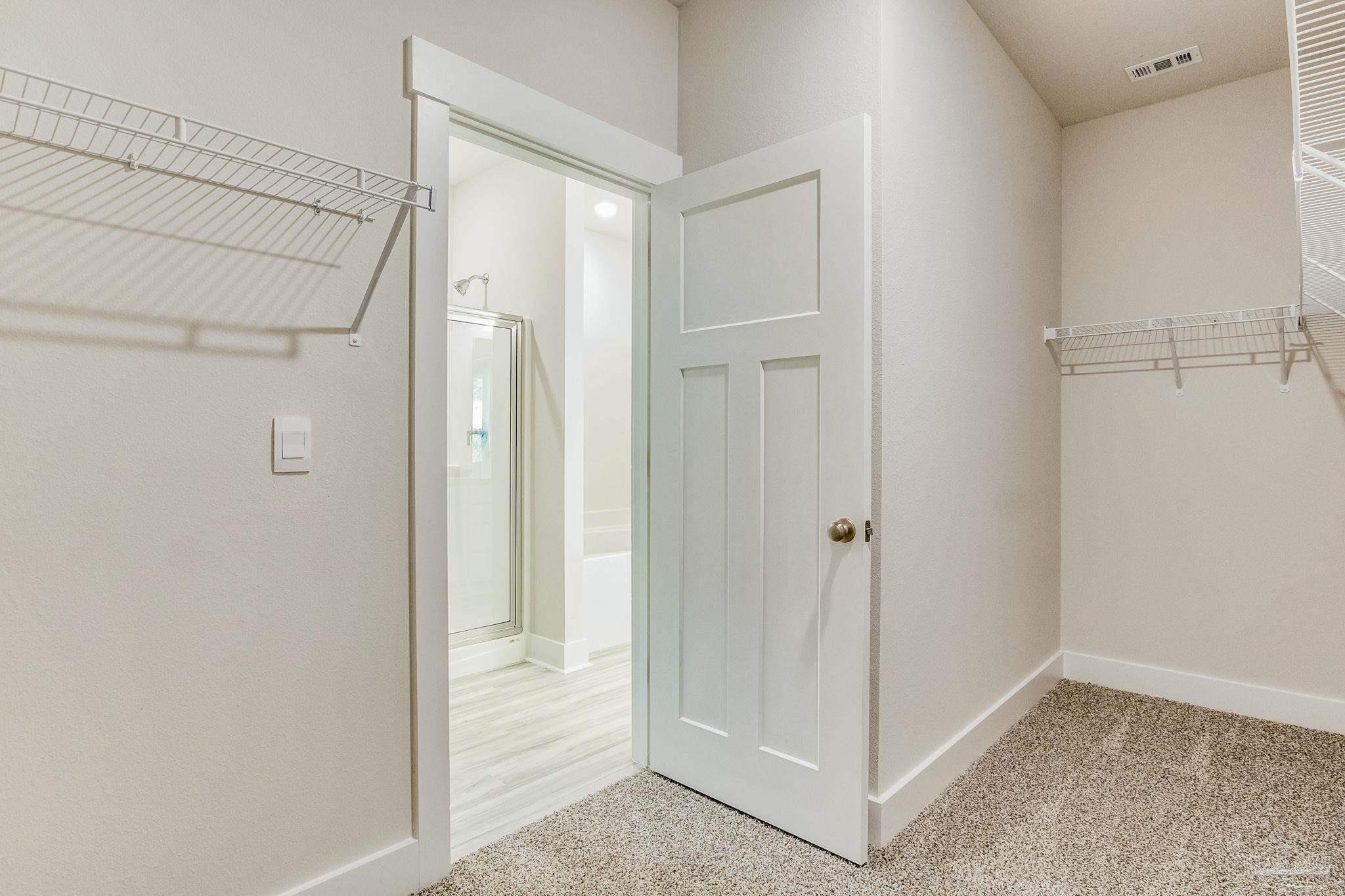 4739 Eider Road Pace, FL 32571 - Photo 19 of 30 a view of a bathroom with shower