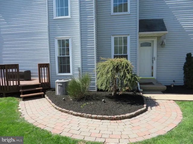 a view of a house with outdoor kitchen