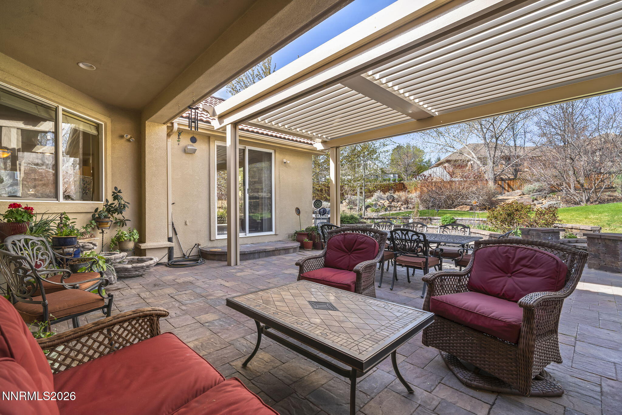 12635 Silver Wolf Road Reno, NV 89511 - Photo 39 of 48 a outdoor living space with furniture and garden view