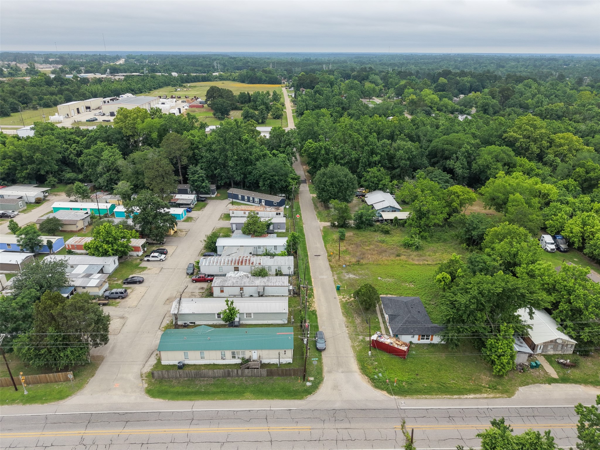 0 Mill Street Willis, TX 77378 - Photo 21 of 24 a view of a city & street