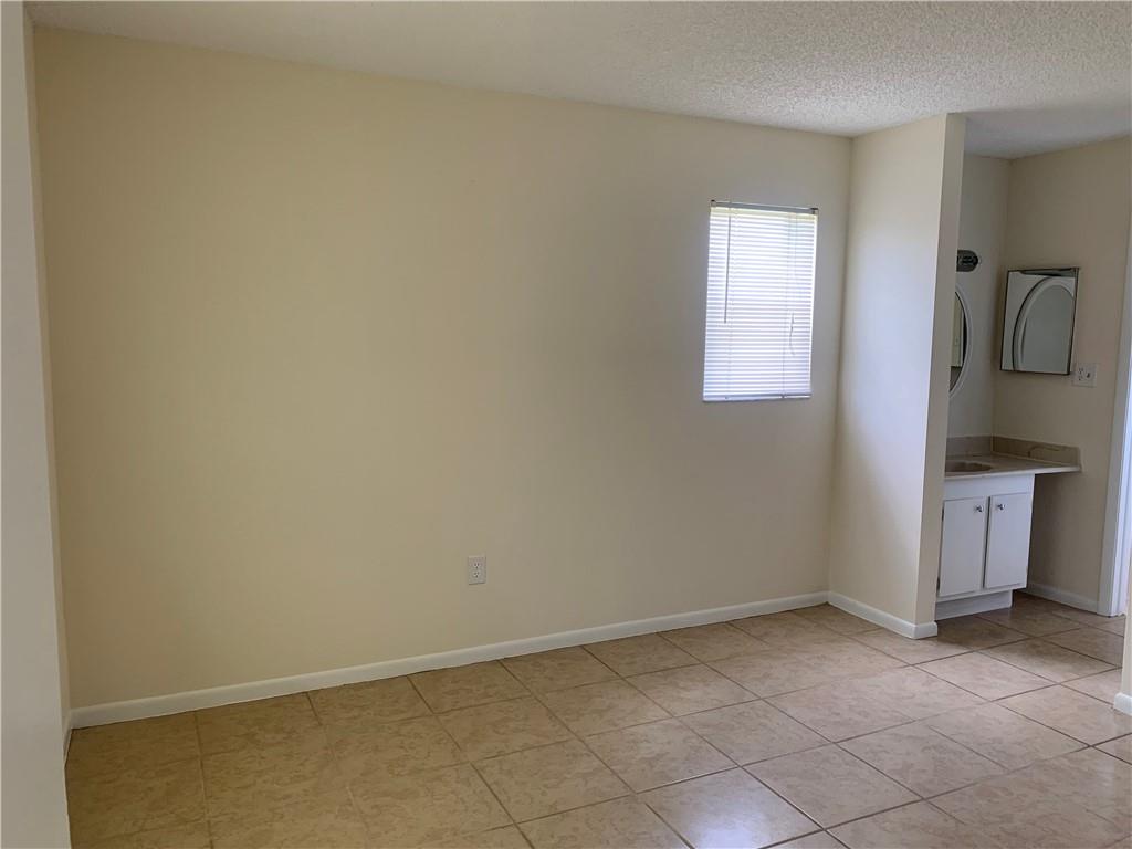 6001 Shaker Wood Circle, Unit 208 Tamarac, FL 33319 - Photo 8 of 13 a view of a kitchen