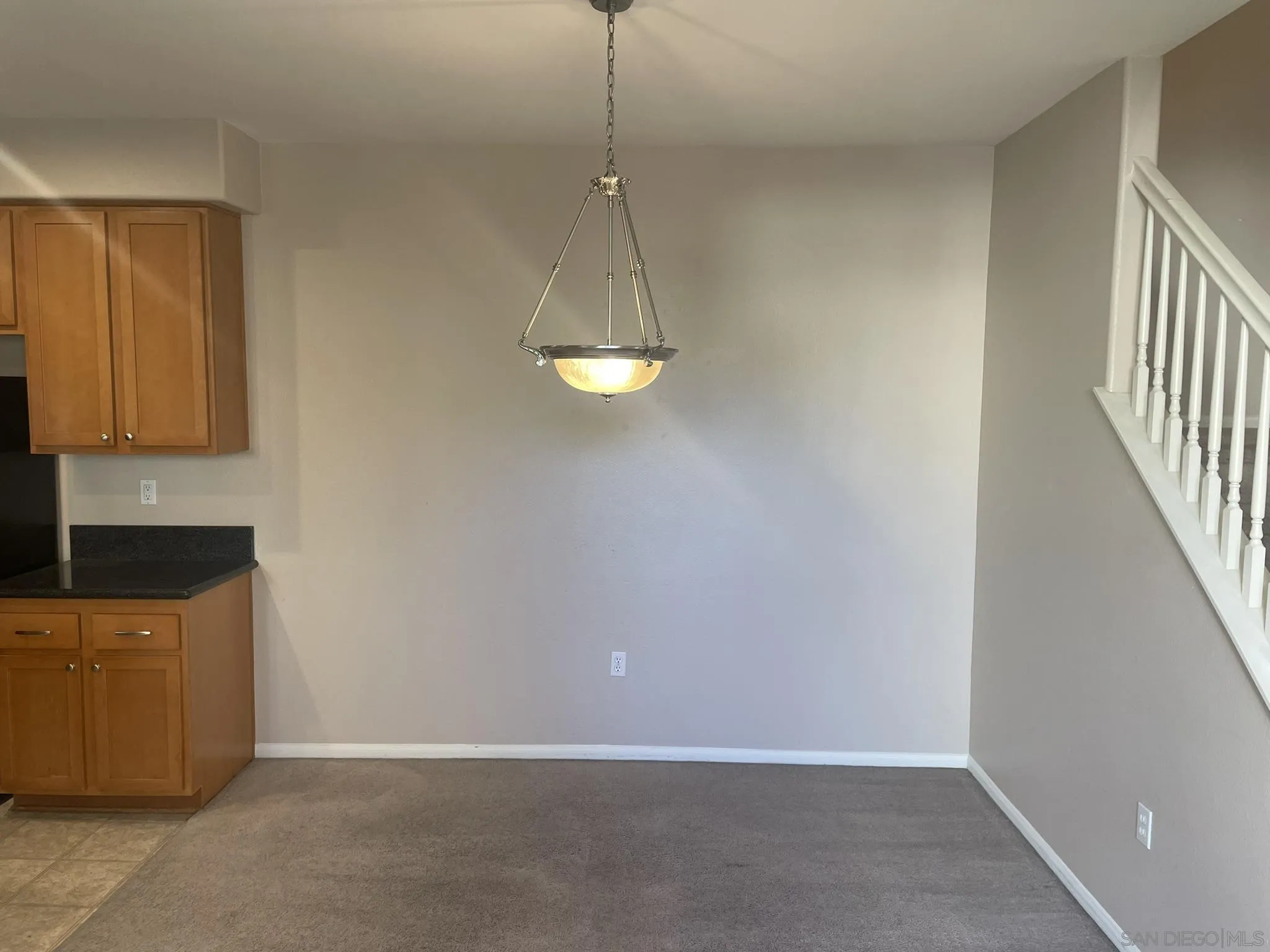 347 Borden Road San Marcos, CA 92069 - Photo 9 of 16 a view of a kitchen with a sink cabinets and wooden floor