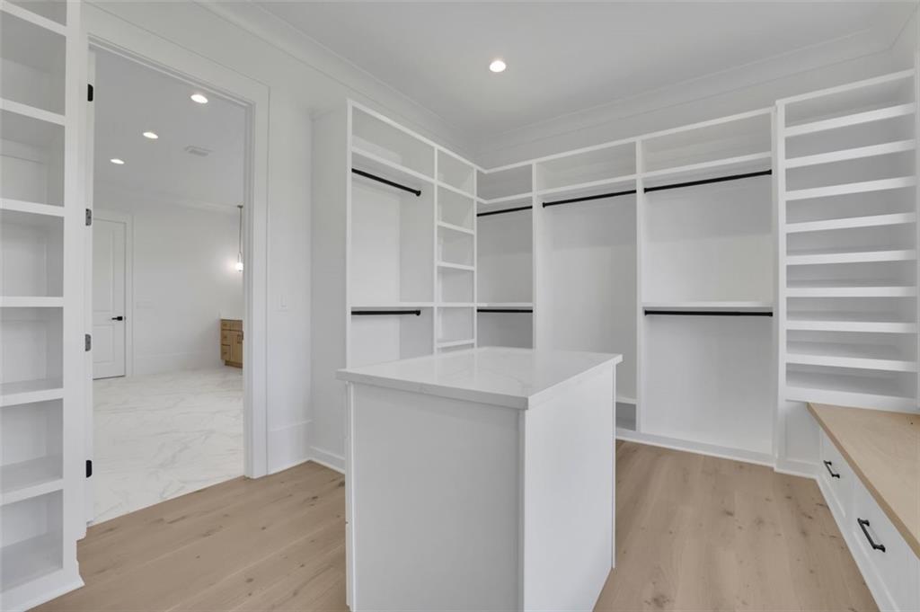 3903 Indian Shoals Road Southeast Bethlehem, GA 30620 - Photo 17 of 35 a bathroom with a shower and a glass door