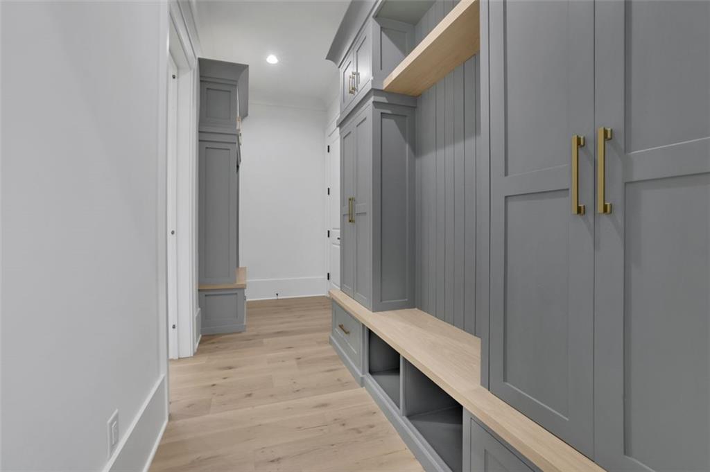 3903 Indian Shoals Road Southeast Bethlehem, GA 30620 - Photo 5 of 35 a hallway with white cabinets