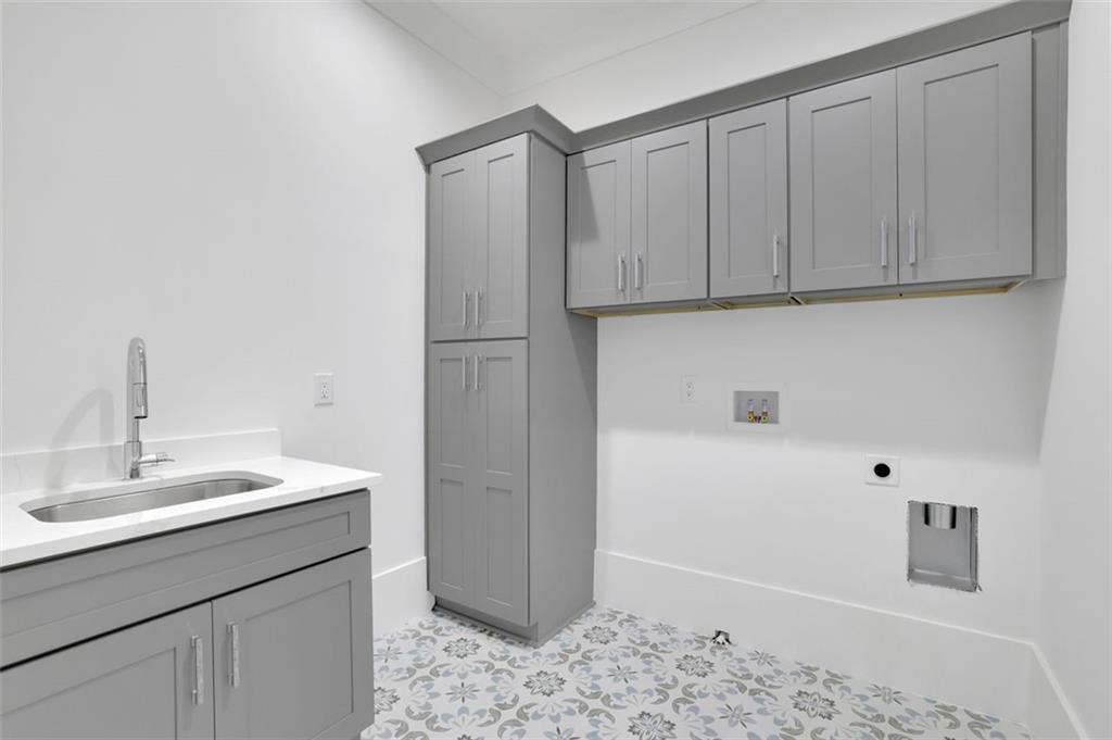 3903 Indian Shoals Road Southeast Bethlehem, GA 30620 - Photo 7 of 35 a bathroom with a sink and a mirror