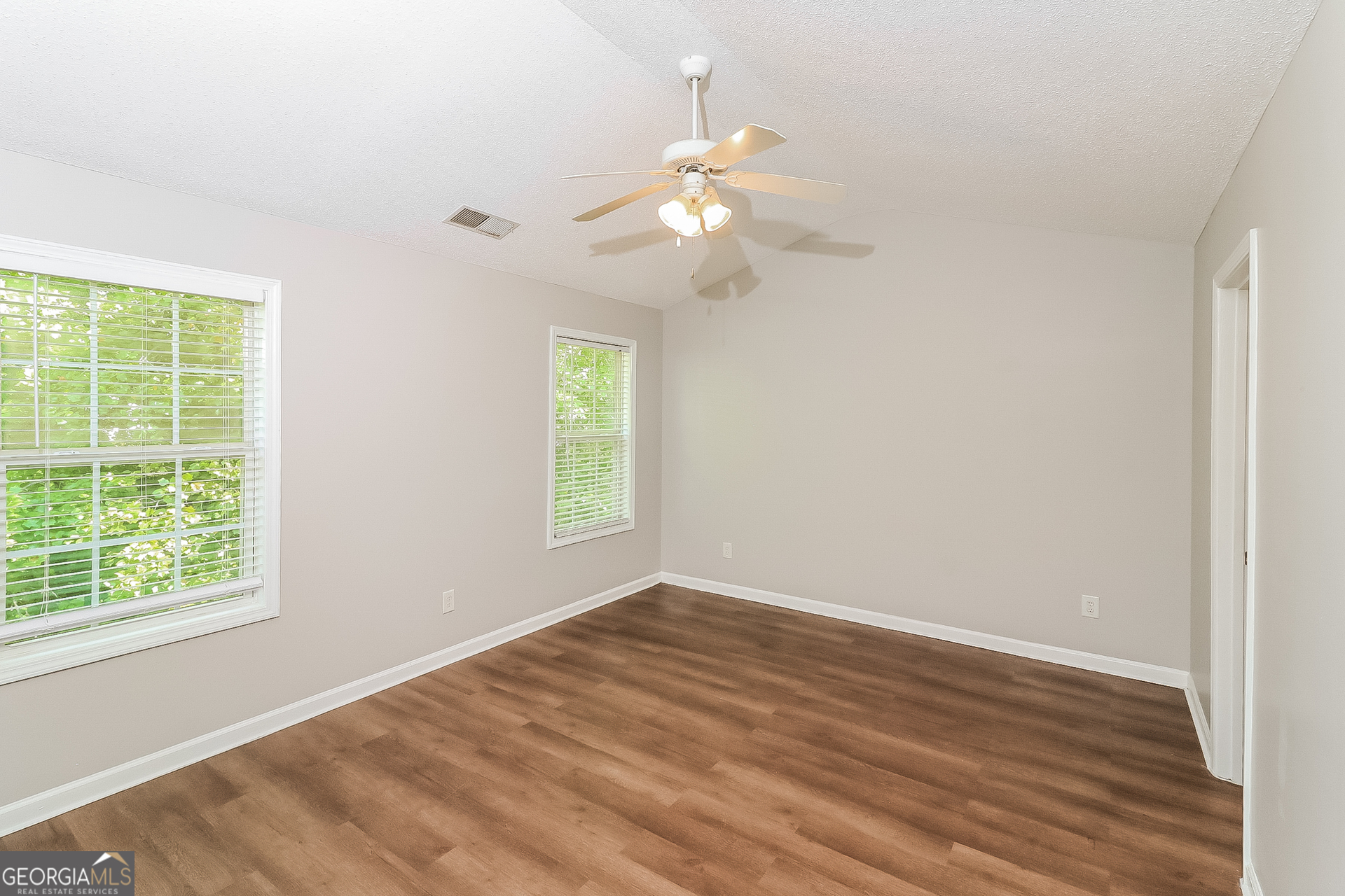 59 Greystone Ridge Hiram, GA 30141 - Photo 14 of 15 wooden floor in an empty room with a window