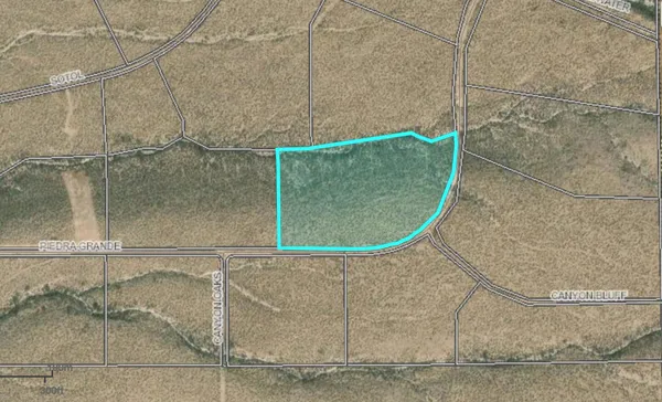 an aerial view of a highlighted house