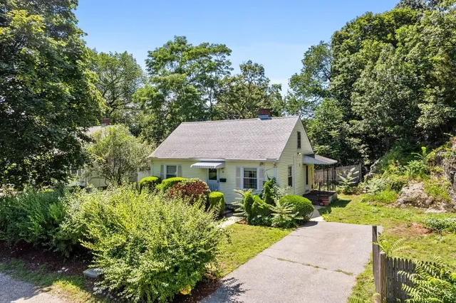 a house view with a garden space