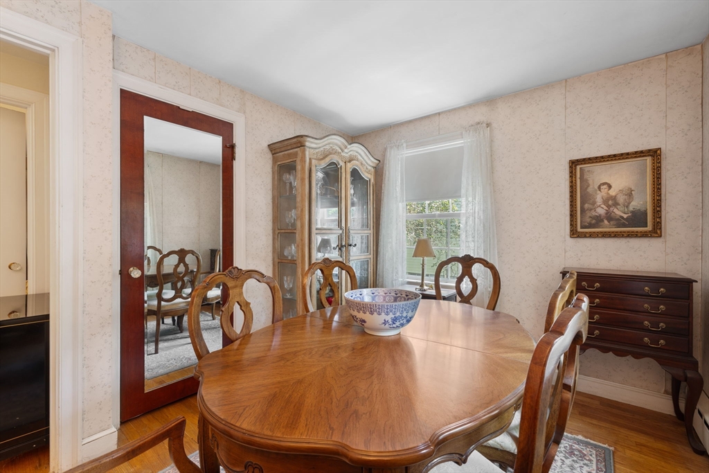 38 Cutter Hill Road Arlington, MA 02474 - Photo 11 of 23 a dining room with furniture and wooden floor