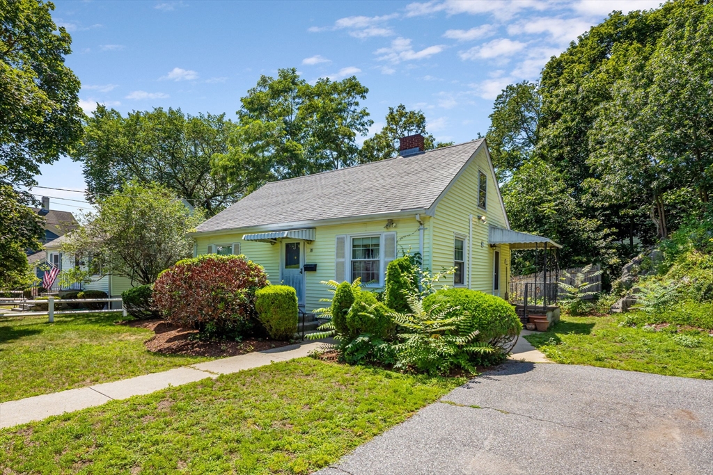 38 Cutter Hill Road Arlington, MA 02474 - Photo 2 of 23 a front view of a house with a garden