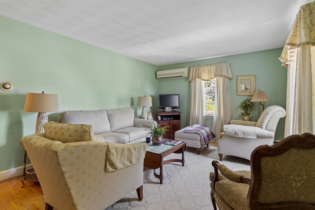 38 Cutter Hill Road Arlington, MA 02474 - Photo 3 of 23 a living room with furniture and a couch