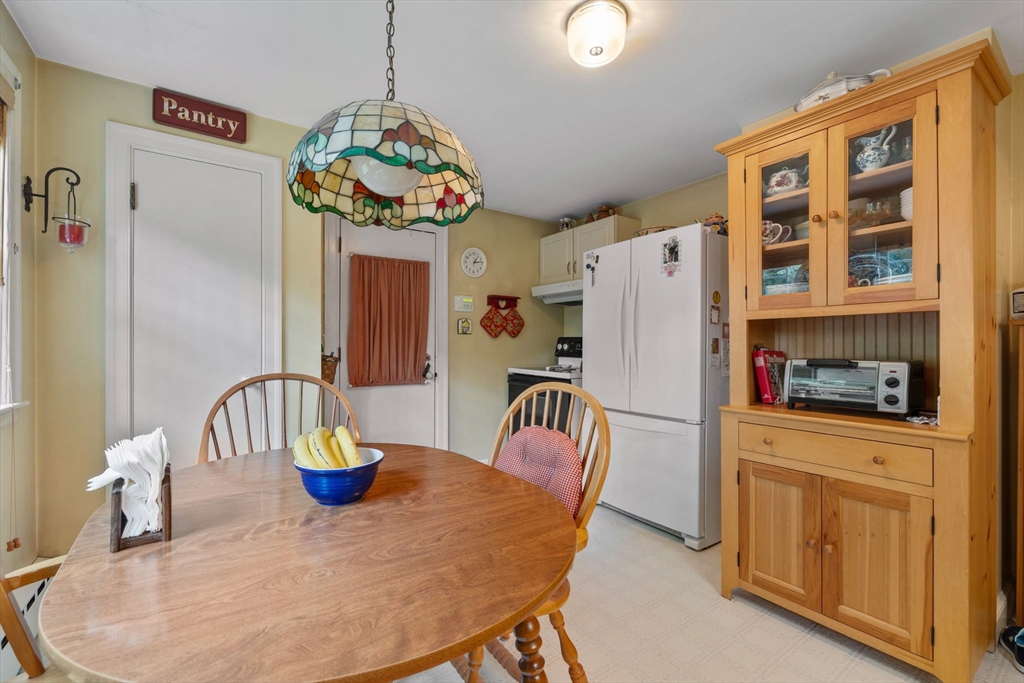 38 Cutter Hill Road Arlington, MA 02474 - Photo 6 of 23 a dining room with furniture and wooden floor