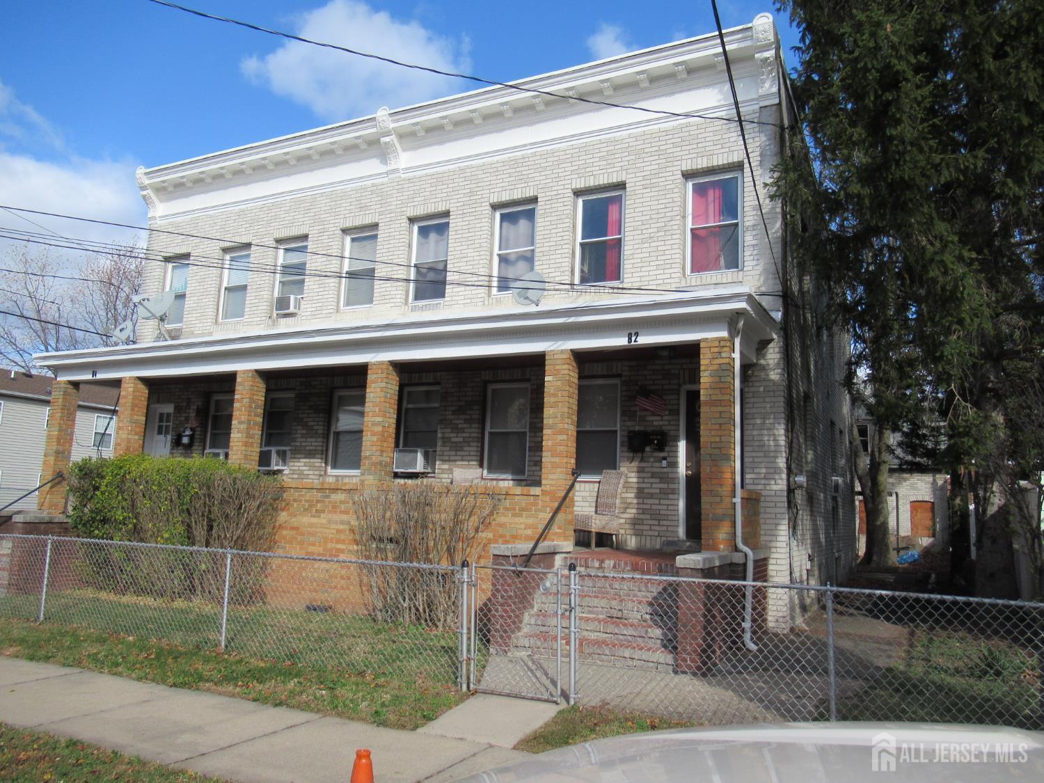 82 Pulaski Avenue Carteret, NJ 07008 - Photo 1 of 47 front view of a house
