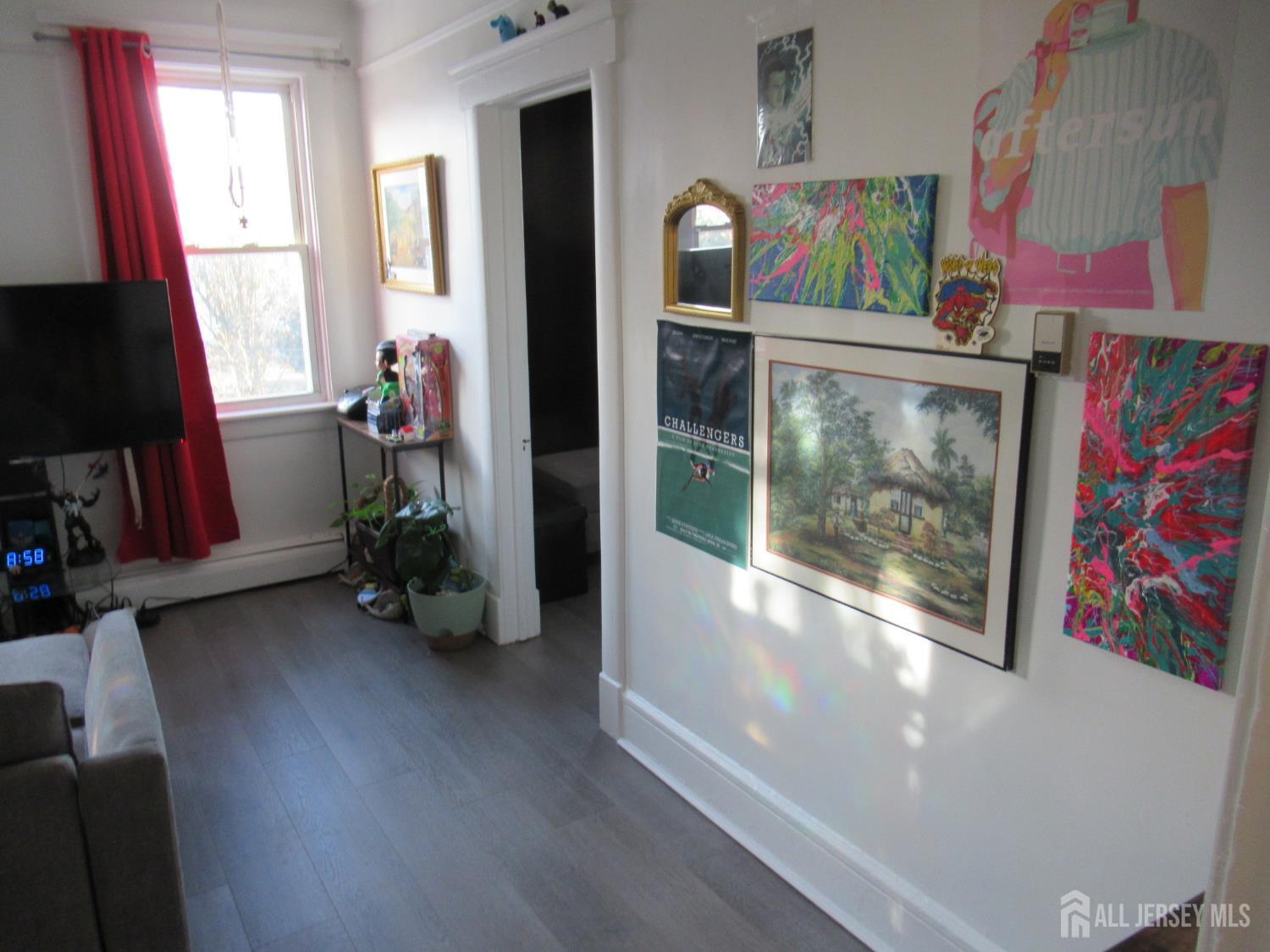 82 Pulaski Avenue Carteret, NJ 07008 - Photo 35 of 47 a view of room with window and furniture