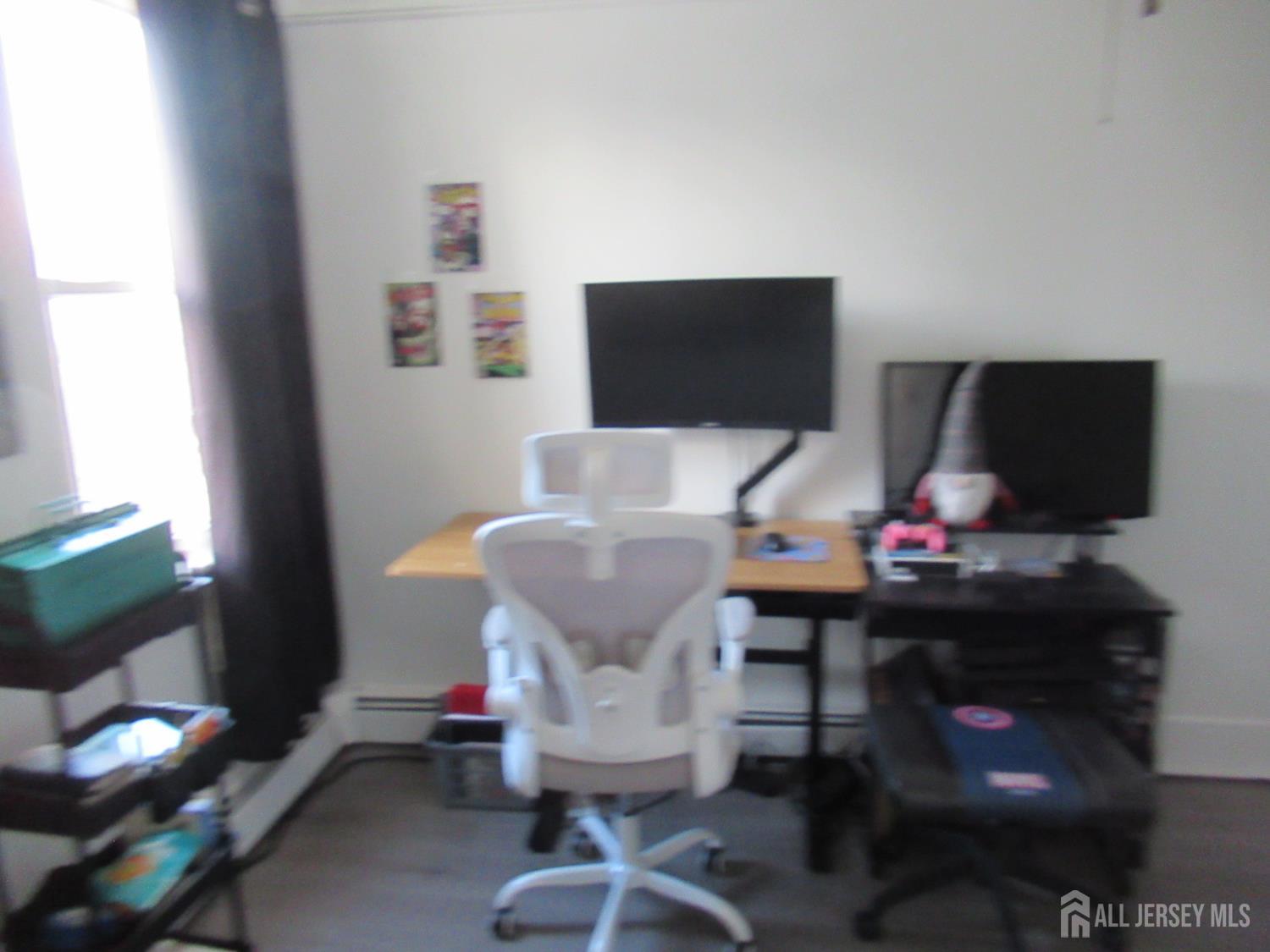 82 Pulaski Avenue Carteret, NJ 07008 - Photo 36 of 47 a living room with furniture and a flat screen tv