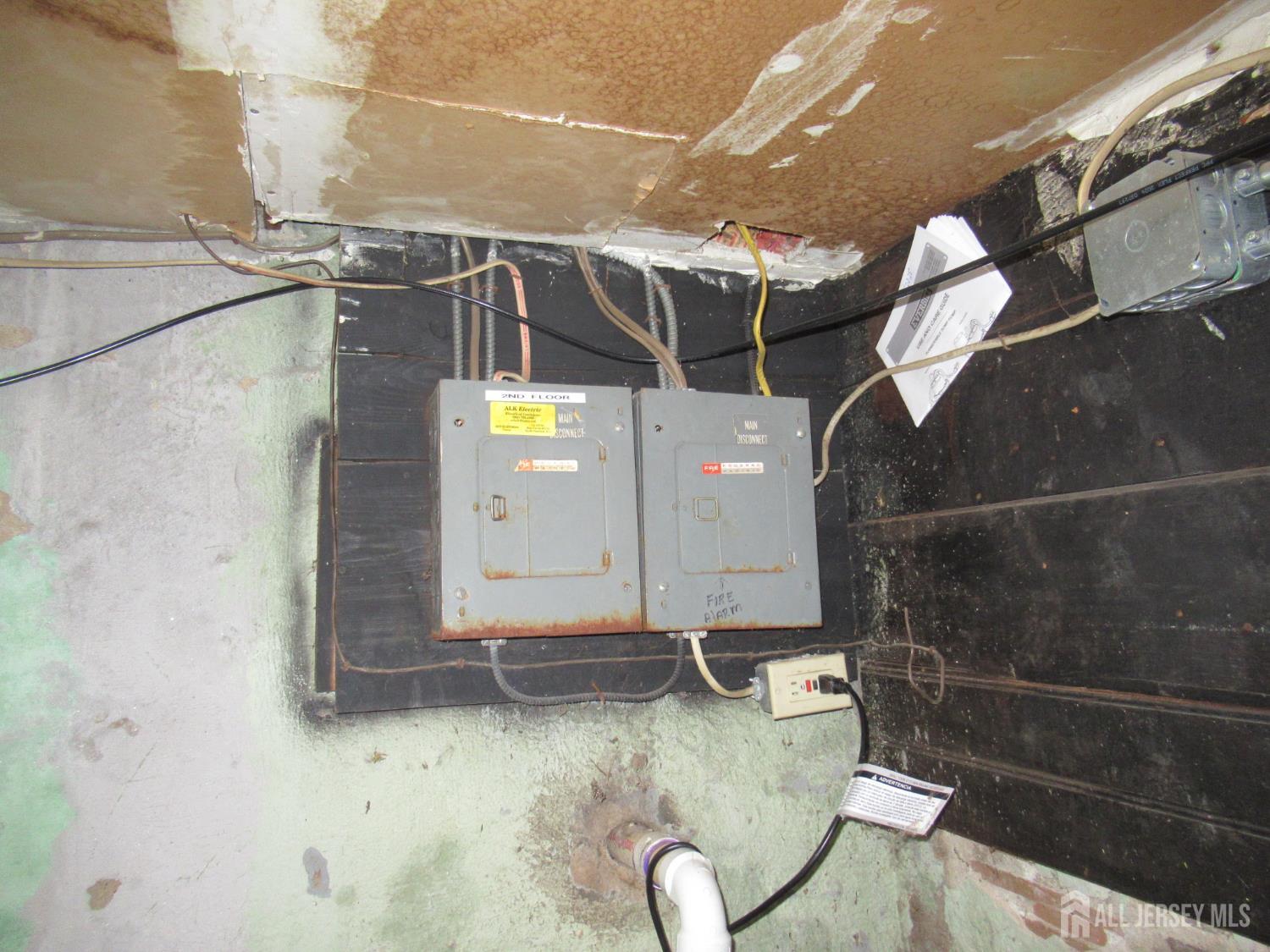 82 Pulaski Avenue Carteret, NJ 07008 - Photo 43 of 47 a bathroom with a sink and mirror