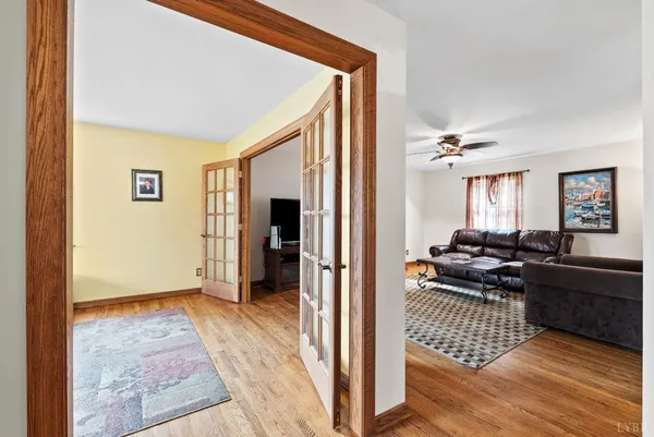 a view of a livingroom with furniture and windows