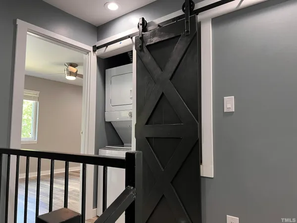 a bathroom with a toilet and a bathtub