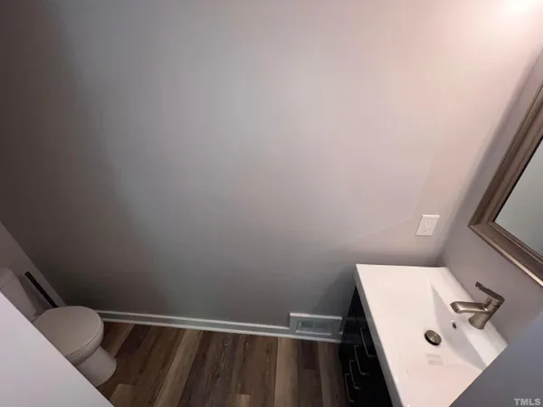 a bathroom with a sink and a window