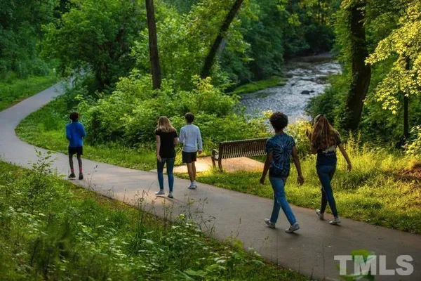 a view of a porch with wooden fence