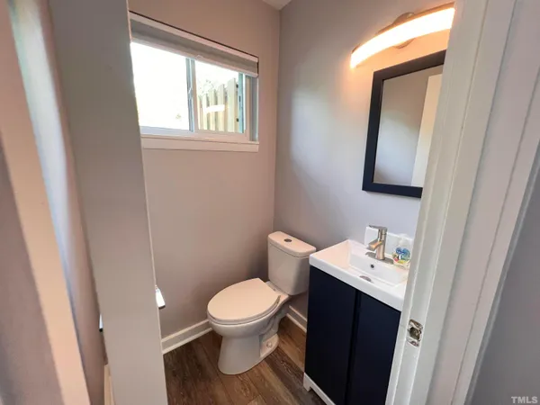 a kitchen with a sink stainless steel appliances and cabinets