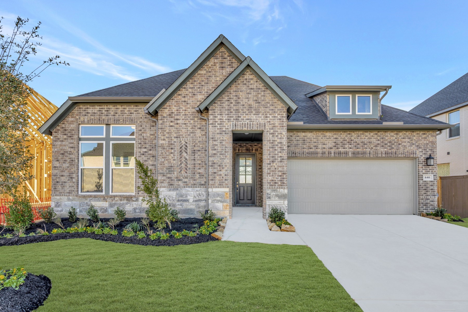 646 Walnut Br Drive Rosenberg, TX 77471 - Photo 1 of 46 a front view of a house with a garden and yard