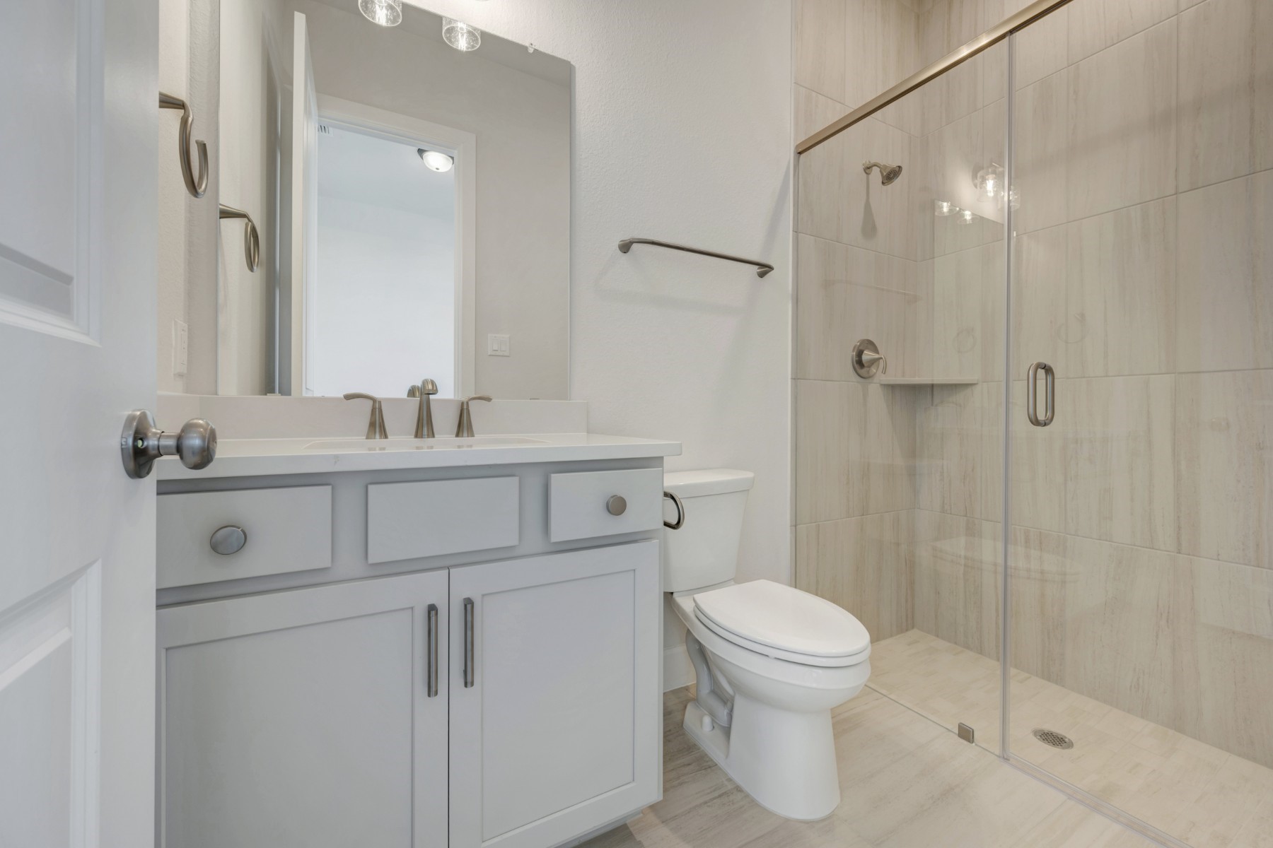 646 Walnut Br Drive Rosenberg, TX 77471 - Photo 18 of 46 a bathroom with a sink toilet and shower