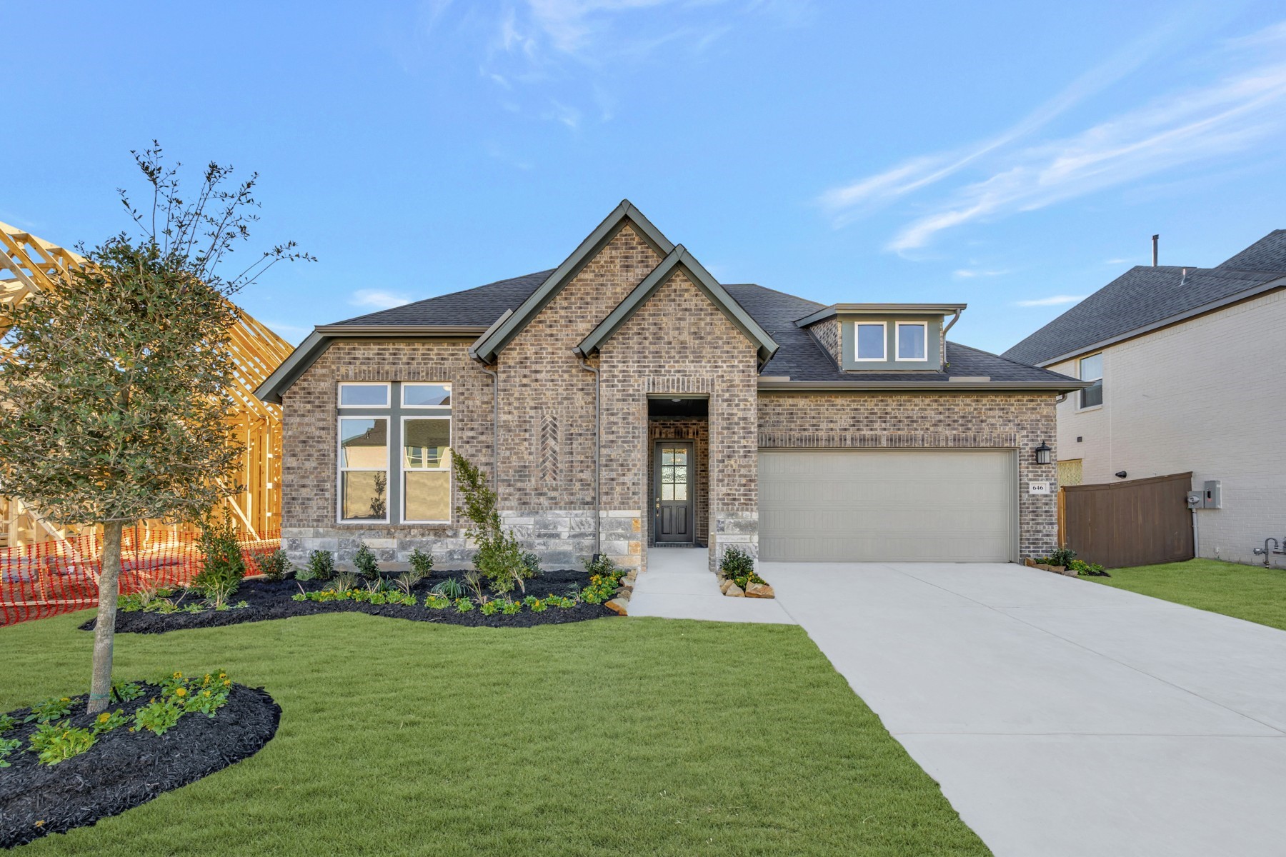 646 Walnut Br Drive Rosenberg, TX 77471 - Photo 2 of 46 a front view of a house with a yard and garage