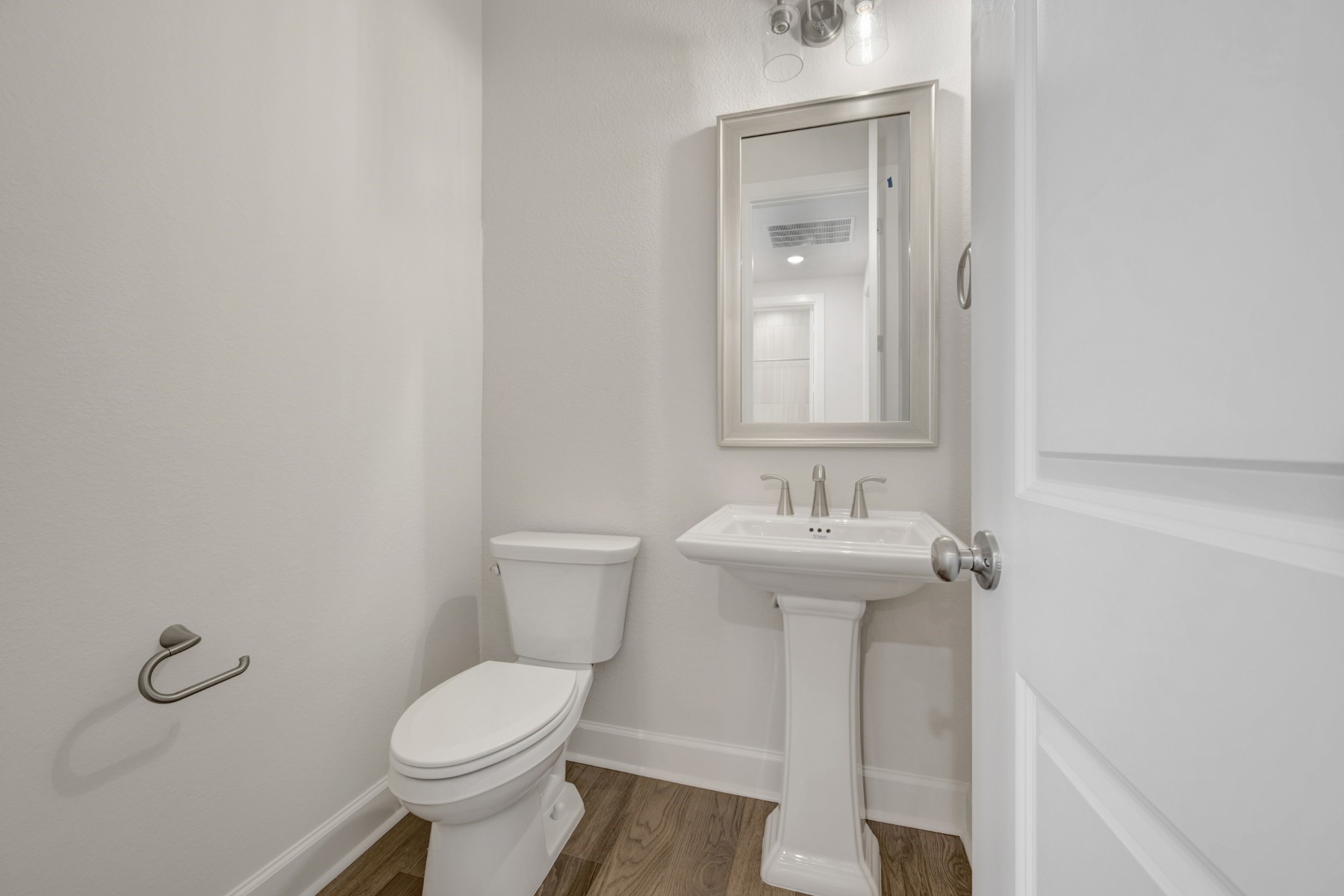 646 Walnut Br Drive Rosenberg, TX 77471 - Photo 26 of 46 a bathroom with a sink toilet and a mirror