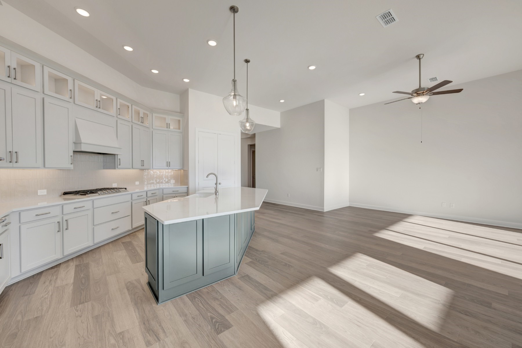 646 Walnut Br Drive Rosenberg, TX 77471 - Photo 33 of 46 a large kitchen with kitchen island a sink stainless steel appliances and cabinets