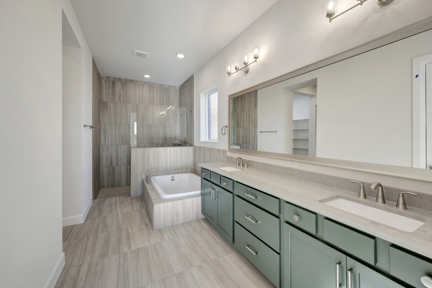 646 Walnut Br Drive Rosenberg, TX 77471 - Photo 40 of 46 a spacious bathroom with a granite countertop sink a toilet a mirror and shower