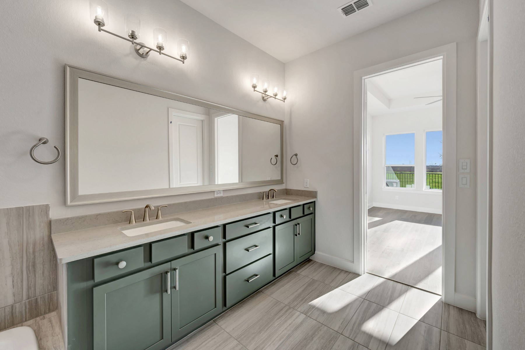 646 Walnut Br Drive Rosenberg, TX 77471 - Photo 41 of 46 a bathroom with a double vanity sink and a mirror