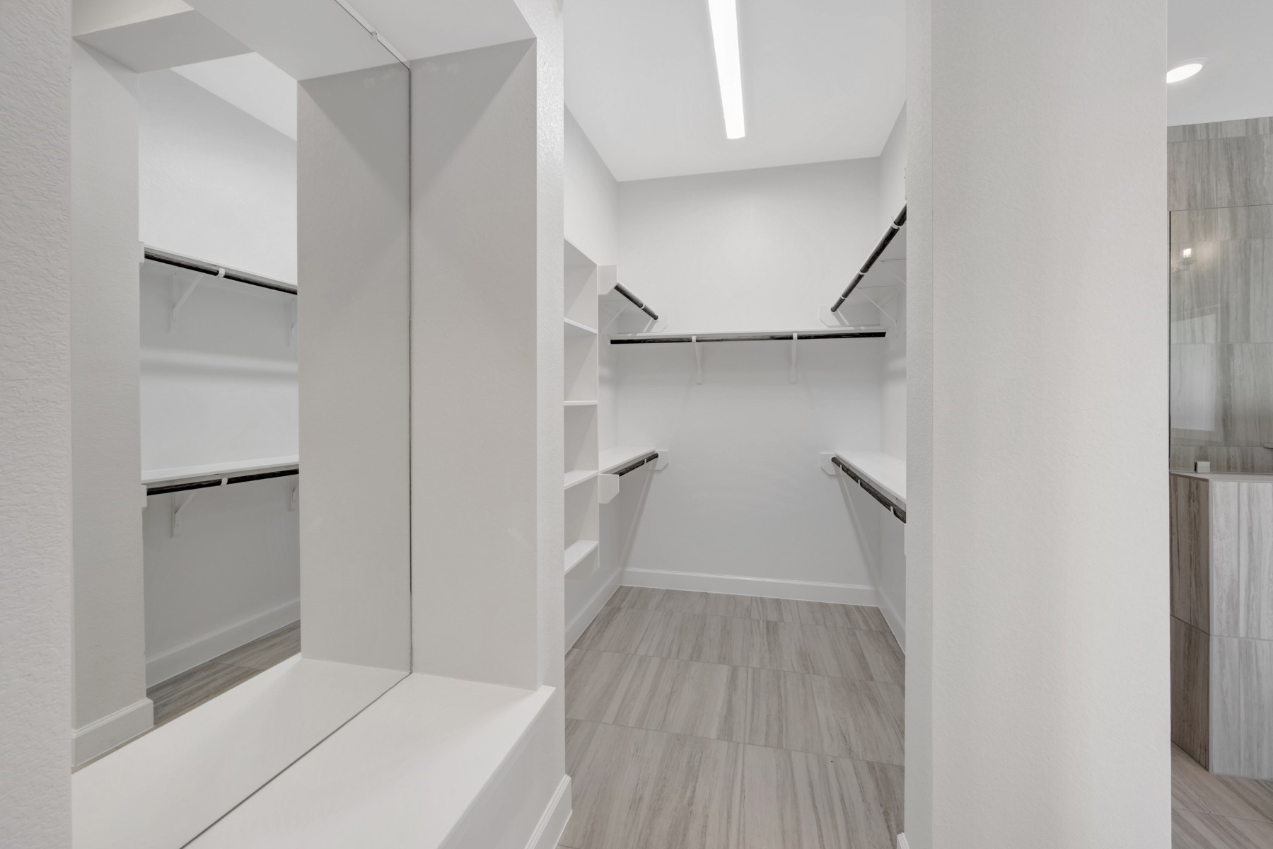 646 Walnut Br Drive Rosenberg, TX 77471 - Photo 42 of 46 a view of walk in closet with empty racks