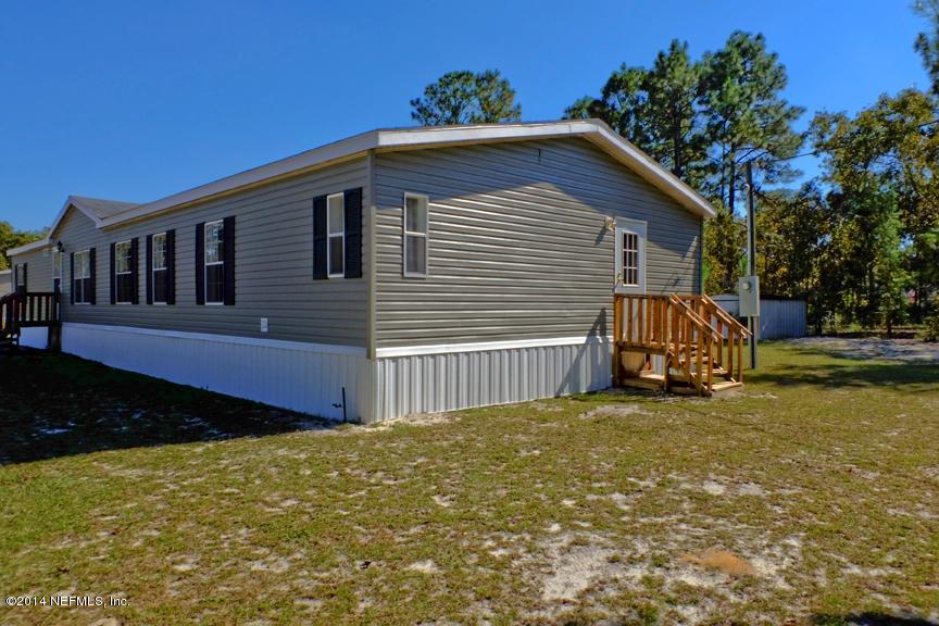 6045 Oak Leaf Road Keystone Heights, FL 32656 - Photo 3 of 24 Side view