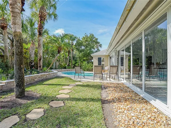 a view of a swimming pool with a patio