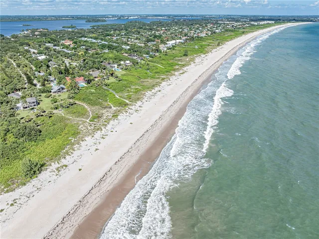 a view of a lake with a large building