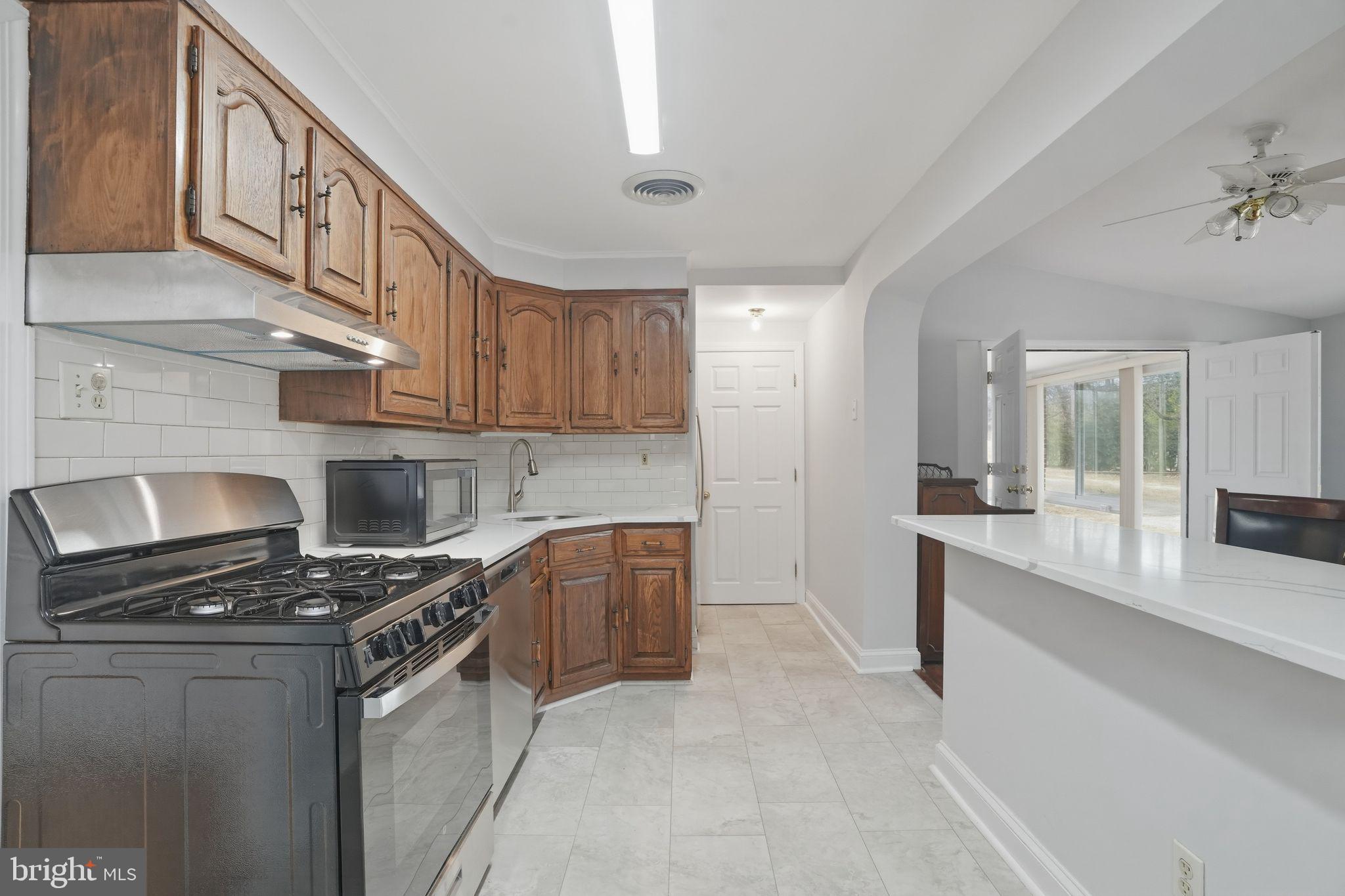 616 Hey Lane Springfield, PA 19064 - Photo 14 of 35 a kitchen with cabinets and appliances