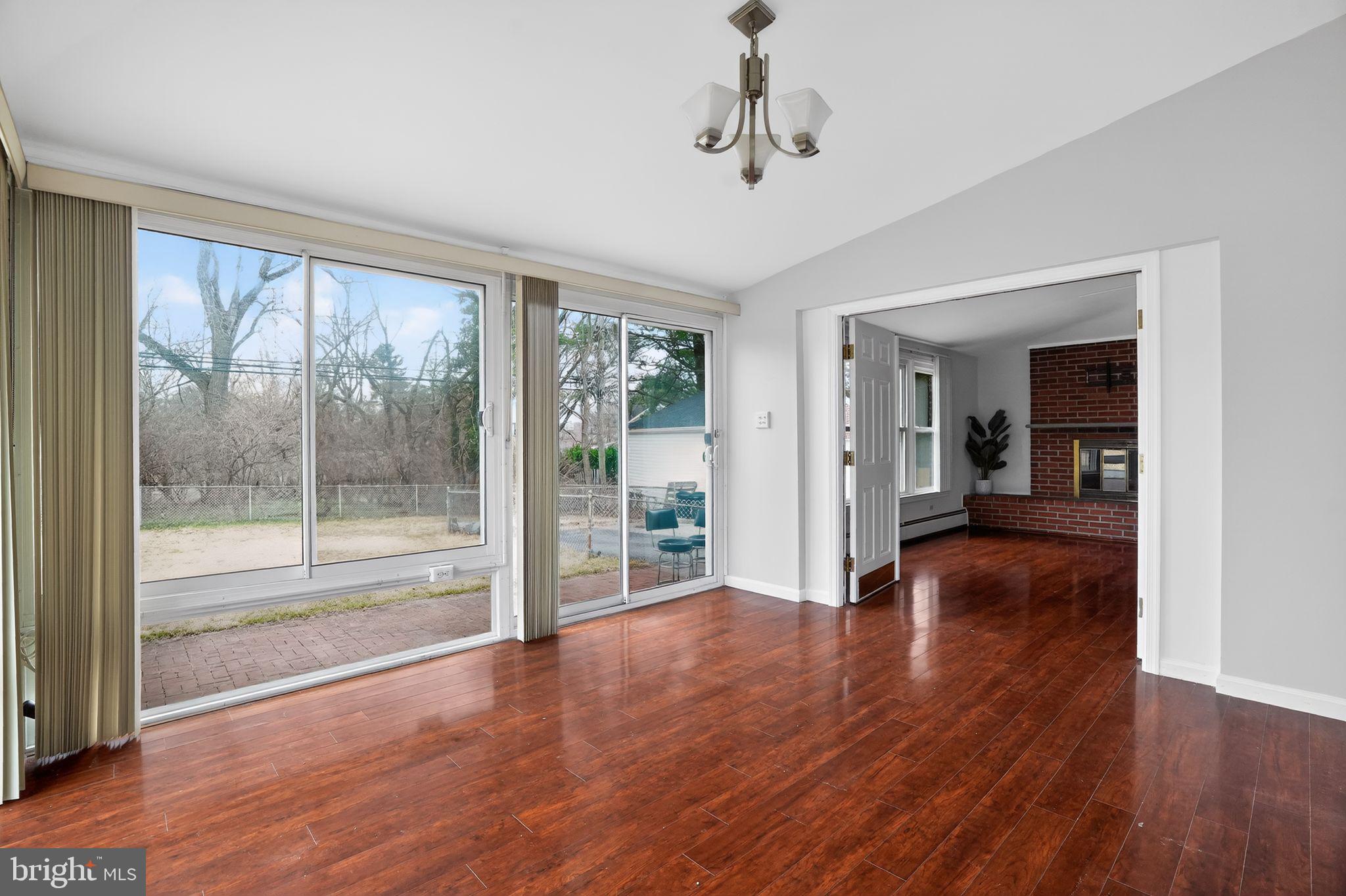 616 Hey Lane Springfield, PA 19064 - Photo 16 of 35 a view of empty room with wooden floor and fan