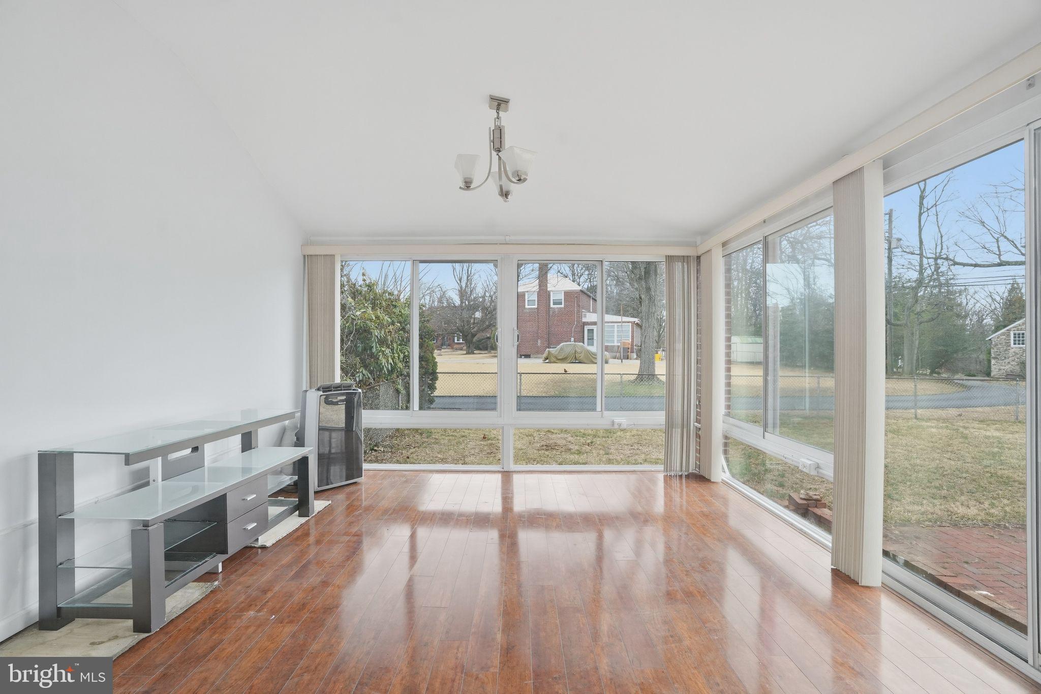 616 Hey Lane Springfield, PA 19064 - Photo 17 of 35 a view of a room with wooden floor and windows