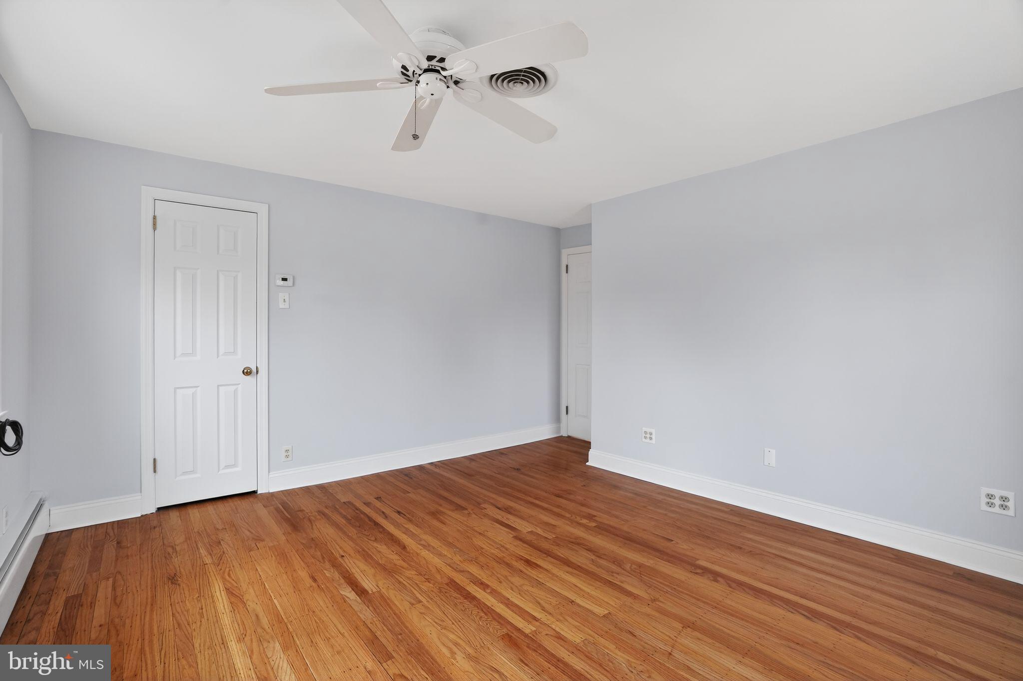 616 Hey Lane Springfield, PA 19064 - Photo 20 of 35 a view of empty room with wooden floor