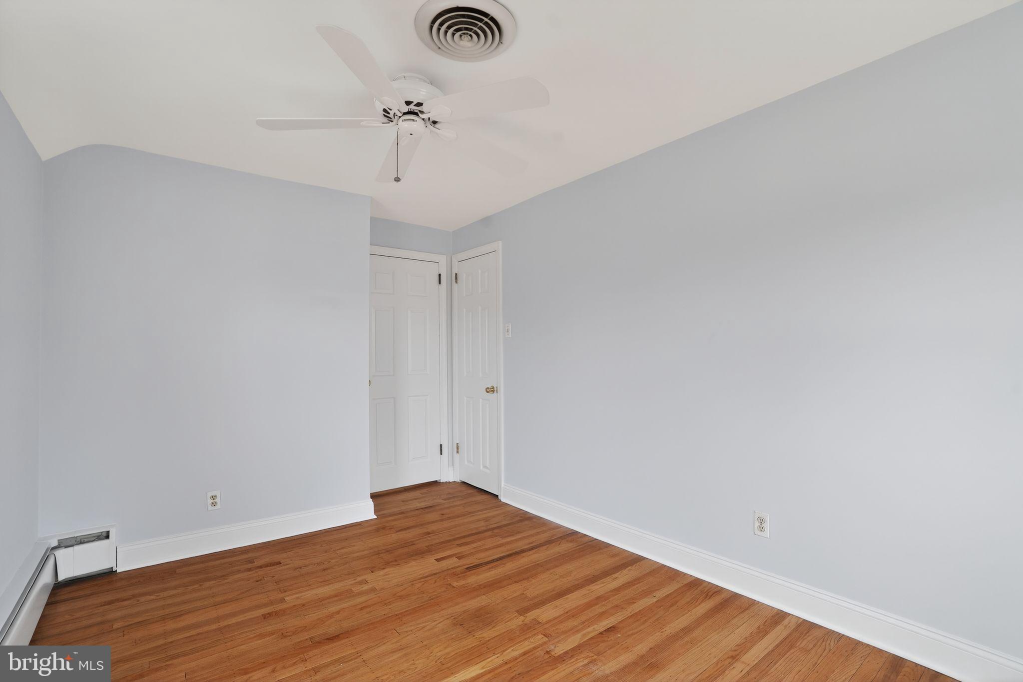 616 Hey Lane Springfield, PA 19064 - Photo 21 of 35 a view of empty room with wooden floor