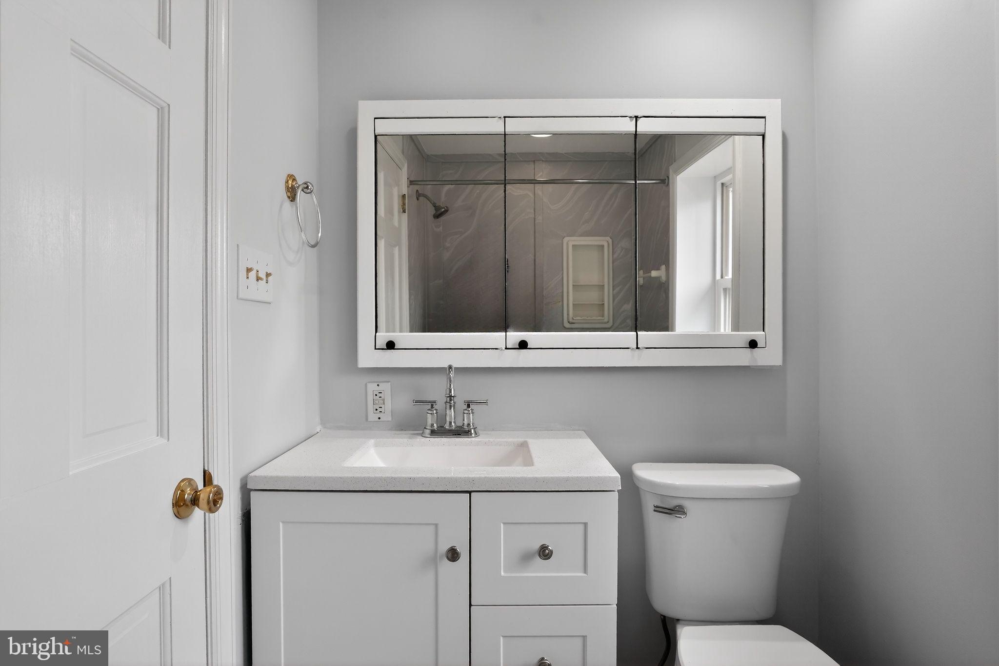 616 Hey Lane Springfield, PA 19064 - Photo 27 of 35 a bathroom with a sink and a toilet