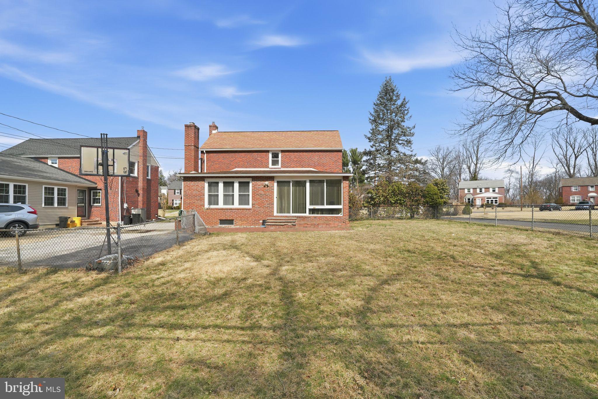 616 Hey Lane Springfield, PA 19064 - Photo 4 of 35 a front view of a house with a yard