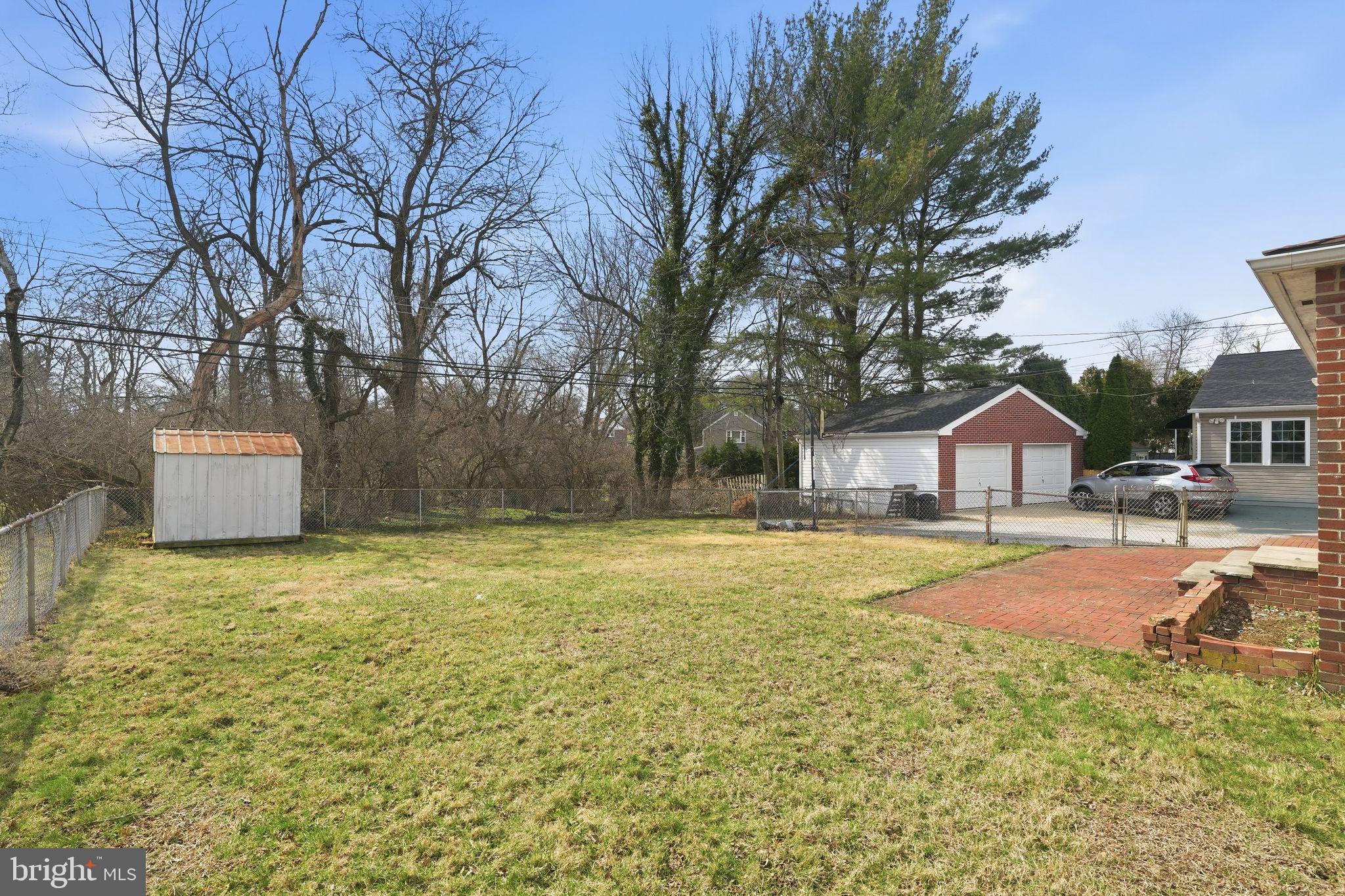 616 Hey Lane Springfield, PA 19064 - Photo 7 of 35 a front view of house with yard and trees