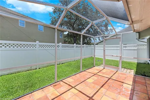 a view of a backyard with a small cabin