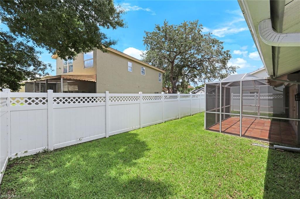 12800 Eagle Pointe Circle Fort Myers, FL 33913 - Photo 24 of 28 a view of a backyard with a small cabin