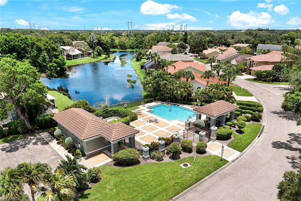 12800 Eagle Pointe Circle Fort Myers, FL 33913 - Photo 27 of 28 an aerial view of multiple houses with yard
