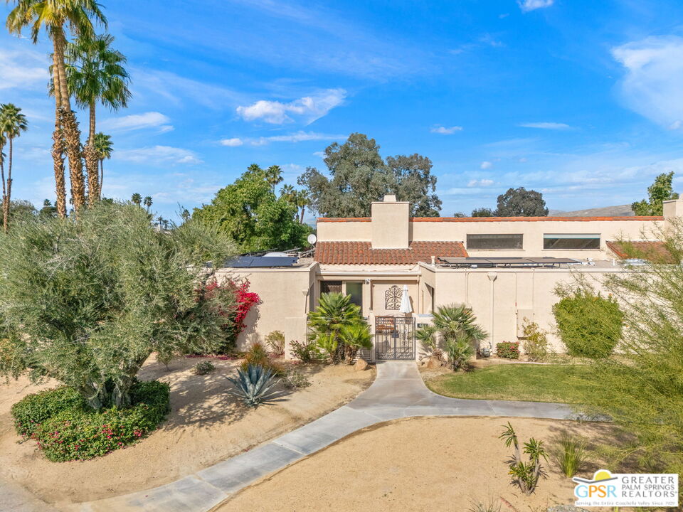 651 Hospitality Drive Rancho Mirage, CA 92270 - Photo 14 of 44 a view of a houses with a street